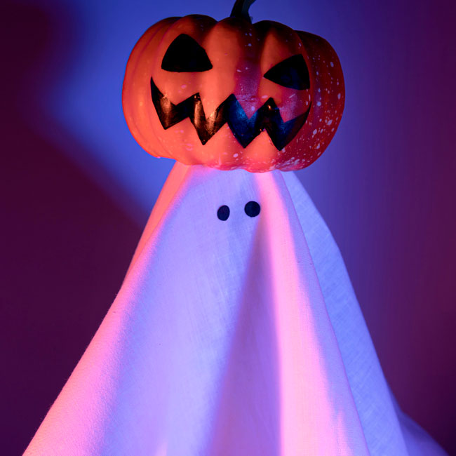 Blacklight Ghost with Pumpkin